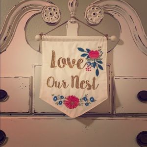 Embroidered “LOVE OUR NEST” pennant